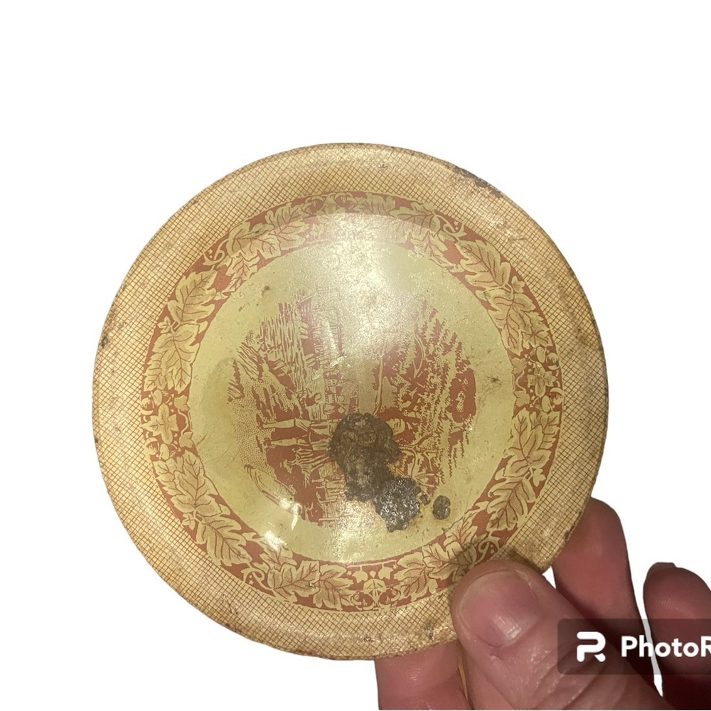 Tin farmer plate with rust damage